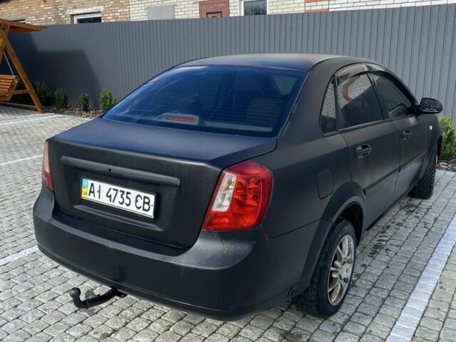 Черный Шевроле Лачетти, объемом двигателя 1.6 л и пробегом 302 тыс. км за 3750 $, фото 1 на Automoto.ua