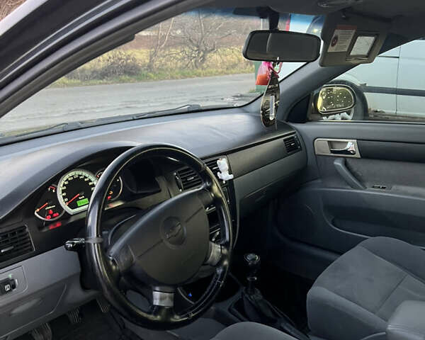 Черный Шевроле Лачетти, объемом двигателя 1.82 л и пробегом 197 тыс. км за 4700 $, фото 17 на Automoto.ua