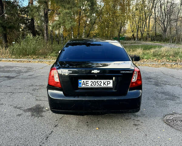 Черный Шевроле Лачетти, объемом двигателя 1.8 л и пробегом 251 тыс. км за 3900 $, фото 4 на Automoto.ua