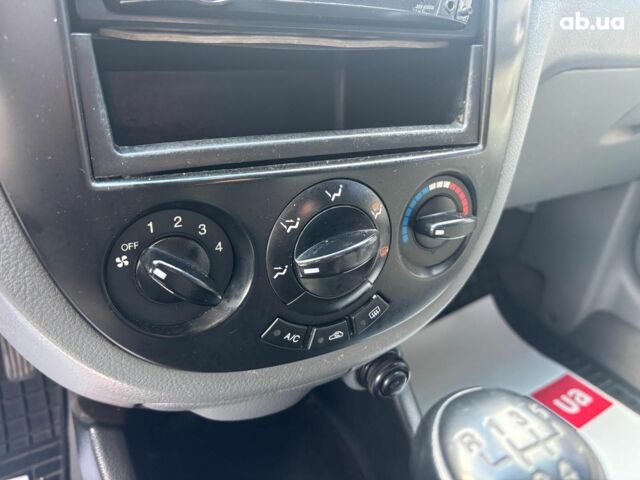 Черный Шевроле Лачетти, объемом двигателя 1.8 л и пробегом 226 тыс. км за 3490 $, фото 19 на Automoto.ua