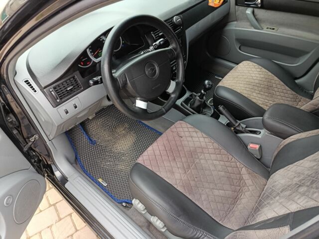 Черный Шевроле Лачетти, объемом двигателя 1.8 л и пробегом 197 тыс. км за 4350 $, фото 19 на Automoto.ua