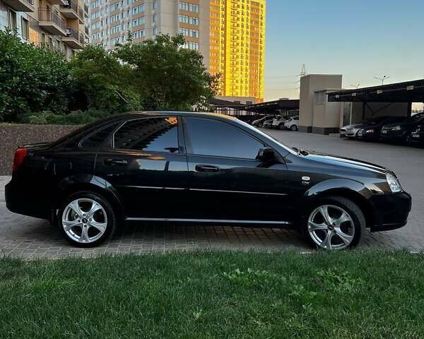 Черный Шевроле Лачетти, объемом двигателя 1.8 л и пробегом 131 тыс. км за 6400 $, фото 13 на Automoto.ua