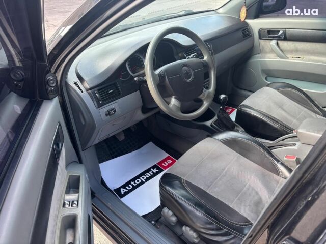 Черный Шевроле Лачетти, объемом двигателя 1.8 л и пробегом 226 тыс. км за 3490 $, фото 12 на Automoto.ua