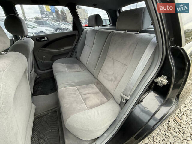 Черный Шевроле Лачетти, объемом двигателя 1.8 л и пробегом 202 тыс. км за 3999 $, фото 34 на Automoto.ua