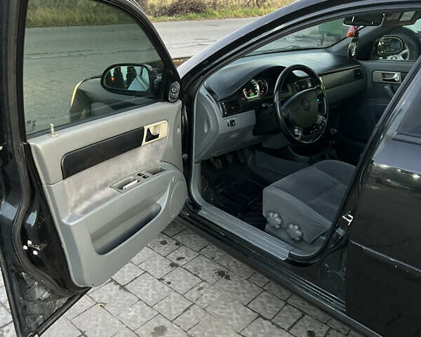 Черный Шевроле Лачетти, объемом двигателя 1.82 л и пробегом 197 тыс. км за 4700 $, фото 16 на Automoto.ua