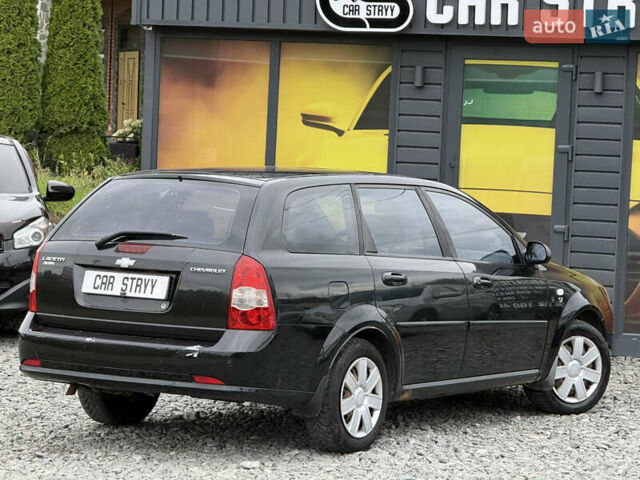 Черный Шевроле Лачетти, объемом двигателя 1.8 л и пробегом 202 тыс. км за 3999 $, фото 17 на Automoto.ua