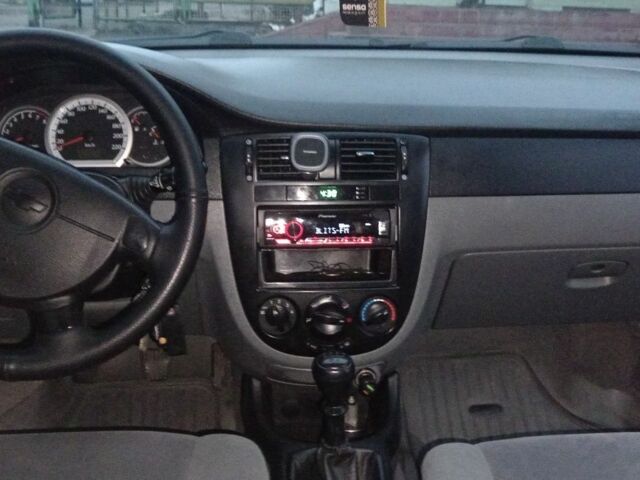 Черный Шевроле Лачетти, объемом двигателя 1.6 л и пробегом 138 тыс. км за 5500 $, фото 6 на Automoto.ua