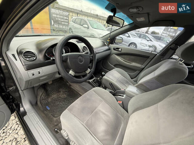 Черный Шевроле Лачетти, объемом двигателя 1.8 л и пробегом 202 тыс. км за 3999 $, фото 35 на Automoto.ua