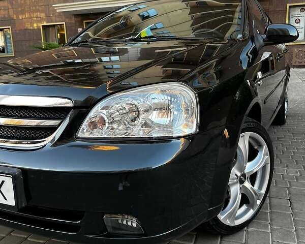 Черный Шевроле Лачетти, объемом двигателя 1.8 л и пробегом 131 тыс. км за 6400 $, фото 2 на Automoto.ua