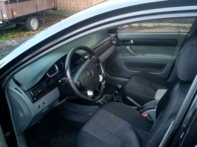 Черный Шевроле Лачетти, объемом двигателя 1.8 л и пробегом 243 тыс. км за 3500 $, фото 7 на Automoto.ua