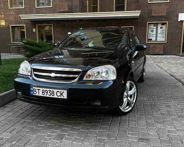 Черный Шевроле Лачетти, объемом двигателя 1.8 л и пробегом 131 тыс. км за 6400 $, фото 25 на Automoto.ua