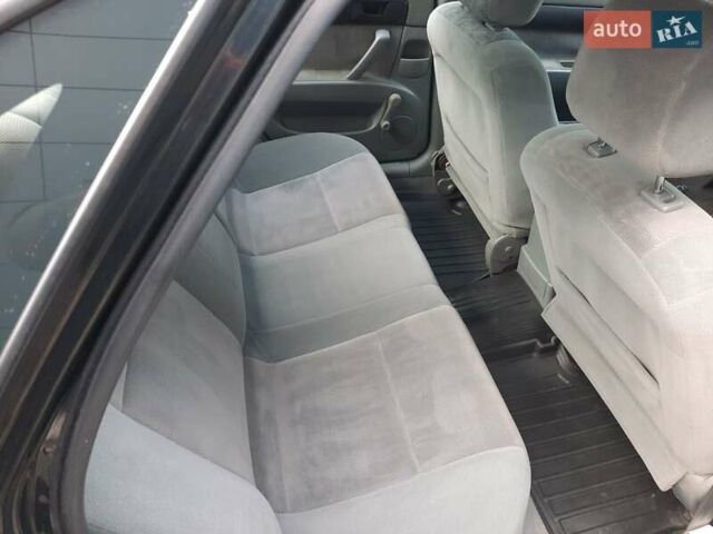 Черный Шевроле Лачетти, объемом двигателя 1.6 л и пробегом 246 тыс. км за 3999 $, фото 1 на Automoto.ua