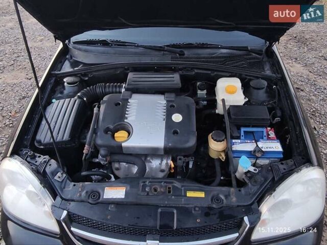 Черный Шевроле Лачетти, объемом двигателя 1.8 л и пробегом 244 тыс. км за 4200 $, фото 16 на Automoto.ua