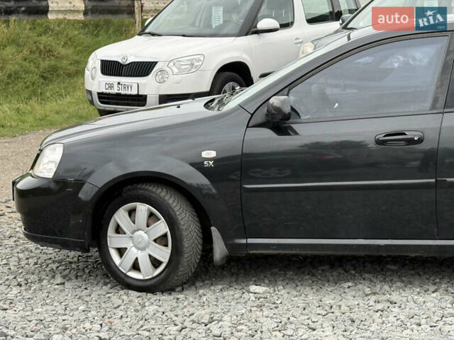 Черный Шевроле Лачетти, объемом двигателя 1.8 л и пробегом 202 тыс. км за 3999 $, фото 13 на Automoto.ua