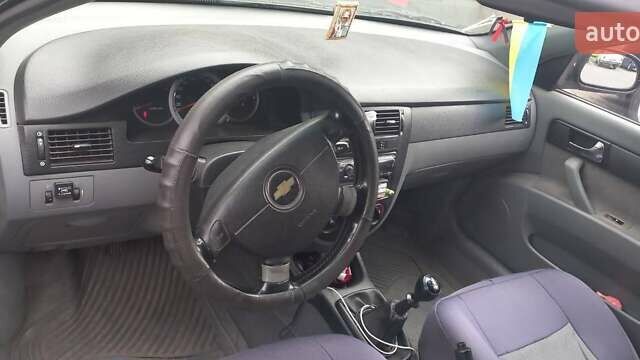 Черный Шевроле Лачетти, объемом двигателя 1.8 л и пробегом 170 тыс. км за 4800 $, фото 4 на Automoto.ua