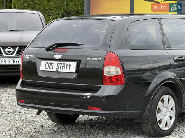 Черный Шевроле Лачетти, объемом двигателя 1.8 л и пробегом 202 тыс. км за 3999 $, фото 18 на Automoto.ua