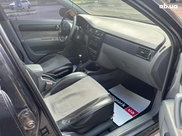 Черный Шевроле Лачетти, объемом двигателя 1.8 л и пробегом 226 тыс. км за 3490 $, фото 14 на Automoto.ua