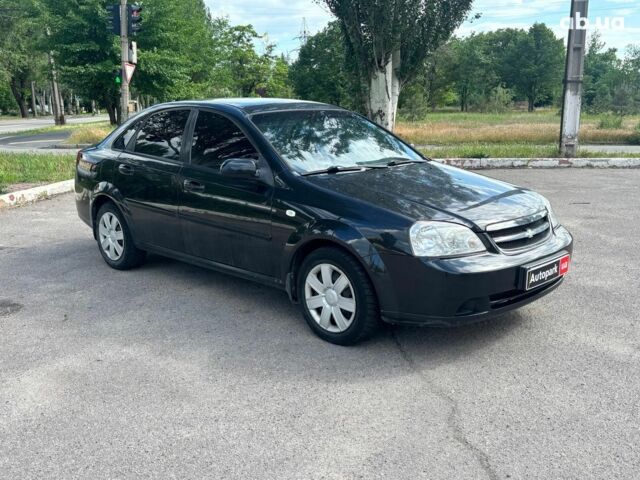 Черный Шевроле Лачетти, объемом двигателя 1.8 л и пробегом 226 тыс. км за 3490 $, фото 6 на Automoto.ua