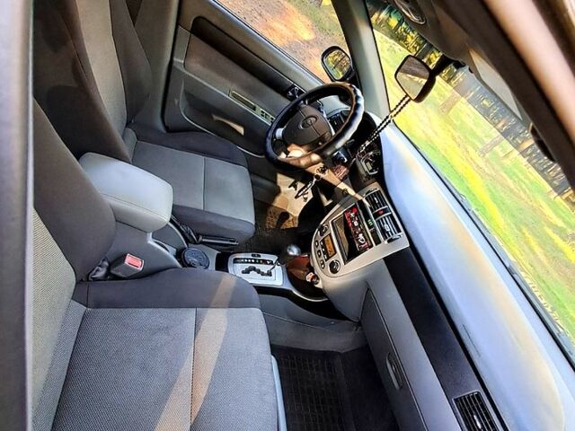 Черный Шевроле Лачетти, объемом двигателя 1.8 л и пробегом 180 тыс. км за 5300 $, фото 5 на Automoto.ua