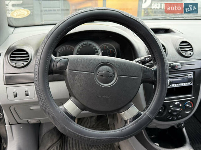 Черный Шевроле Лачетти, объемом двигателя 1.8 л и пробегом 202 тыс. км за 3999 $, фото 38 на Automoto.ua