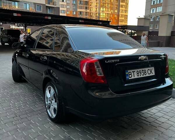 Черный Шевроле Лачетти, объемом двигателя 1.8 л и пробегом 131 тыс. км за 6400 $, фото 5 на Automoto.ua