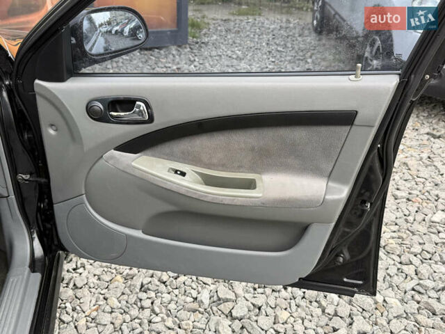 Черный Шевроле Лачетти, объемом двигателя 1.8 л и пробегом 202 тыс. км за 3999 $, фото 28 на Automoto.ua