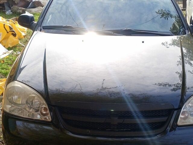 Черный Шевроле Лачетти, объемом двигателя 1.8 л и пробегом 294 тыс. км за 4000 $, фото 1 на Automoto.ua