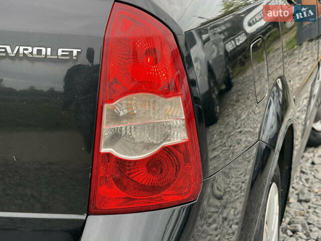 Черный Шевроле Лачетти, объемом двигателя 1.8 л и пробегом 202 тыс. км за 3999 $, фото 20 на Automoto.ua