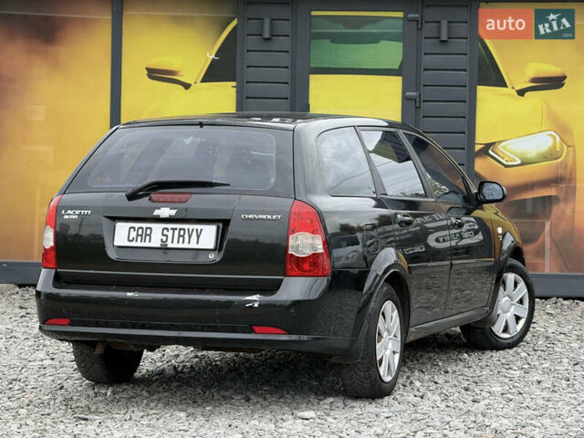 Черный Шевроле Лачетти, объемом двигателя 1.8 л и пробегом 202 тыс. км за 3999 $, фото 14 на Automoto.ua