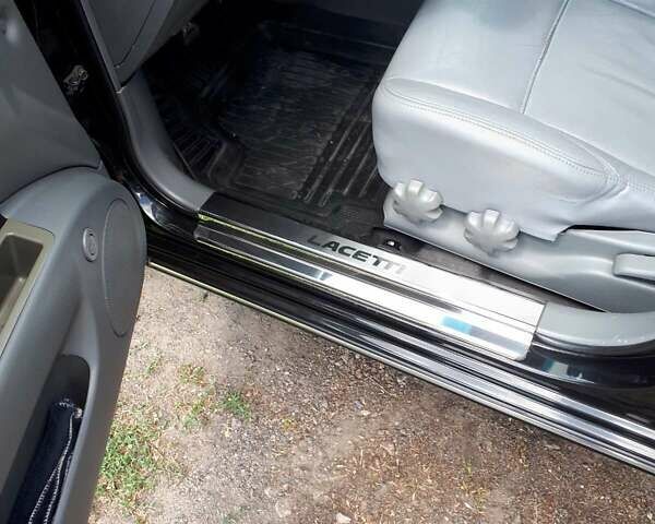 Черный Шевроле Лачетти, объемом двигателя 1.6 л и пробегом 156 тыс. км за 6100 $, фото 16 на Automoto.ua