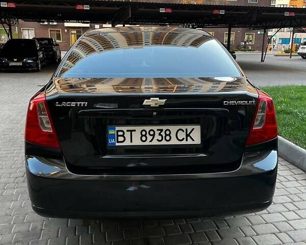 Черный Шевроле Лачетти, объемом двигателя 1.8 л и пробегом 131 тыс. км за 6400 $, фото 12 на Automoto.ua
