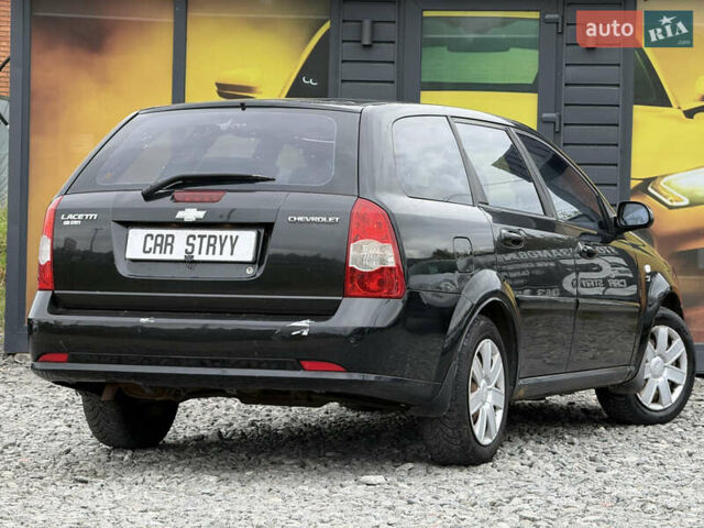 Черный Шевроле Лачетти, объемом двигателя 1.8 л и пробегом 202 тыс. км за 3999 $, фото 16 на Automoto.ua