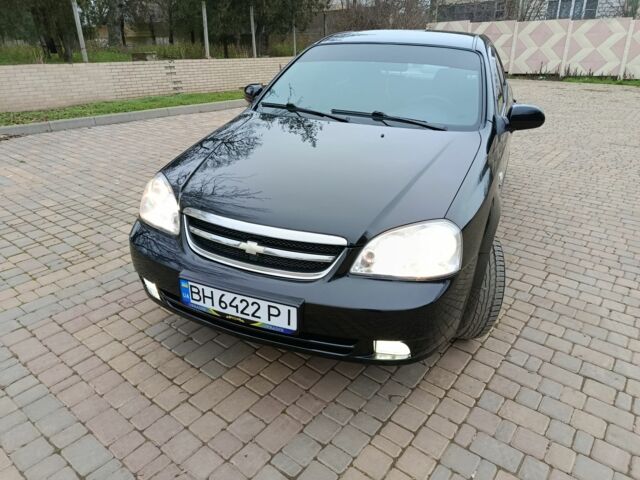 Черный Шевроле Лачетти, объемом двигателя 1.8 л и пробегом 197 тыс. км за 4350 $, фото 2 на Automoto.ua
