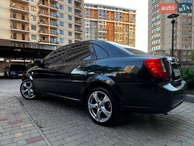 Черный Шевроле Лачетти, объемом двигателя 1.8 л и пробегом 131 тыс. км за 6400 $, фото 33 на Automoto.ua