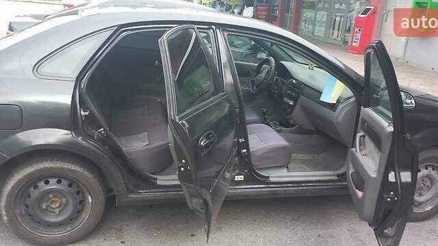 Черный Шевроле Лачетти, объемом двигателя 1.8 л и пробегом 170 тыс. км за 4800 $, фото 1 на Automoto.ua