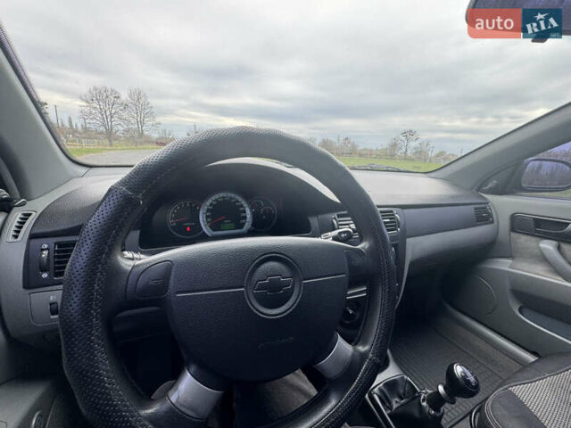 Черный Шевроле Лачетти, объемом двигателя 1.6 л и пробегом 153 тыс. км за 5000 $, фото 10 на Automoto.ua