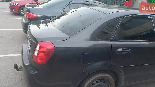 Черный Шевроле Лачетти, объемом двигателя 1.8 л и пробегом 170 тыс. км за 4800 $, фото 3 на Automoto.ua