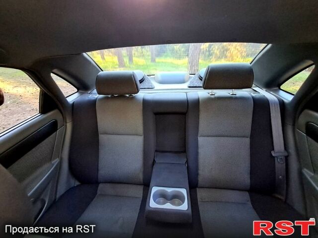 Черный Шевроле Лачетти, объемом двигателя 1.8 л и пробегом 180 тыс. км за 5300 $, фото 6 на Automoto.ua