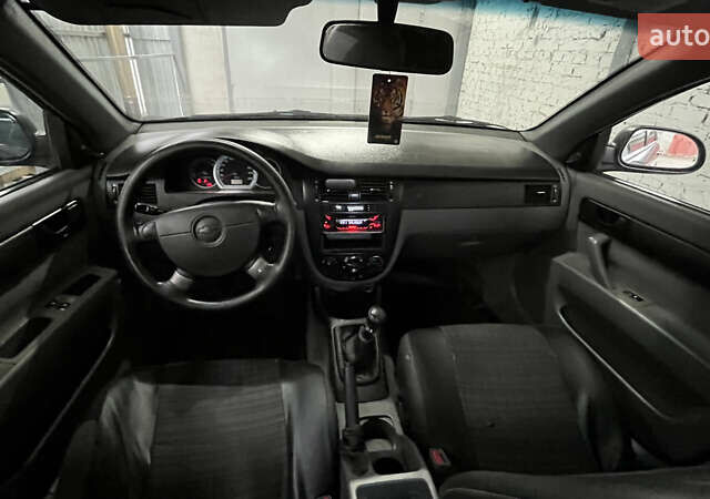 Чорний Шевроле Лачетті, об'ємом двигуна 1.6 л та пробігом 198 тис. км за 3200 $, фото 7 на Automoto.ua