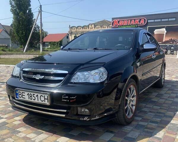 Черный Шевроле Лачетти, объемом двигателя 1.6 л и пробегом 156 тыс. км за 6100 $, фото 4 на Automoto.ua