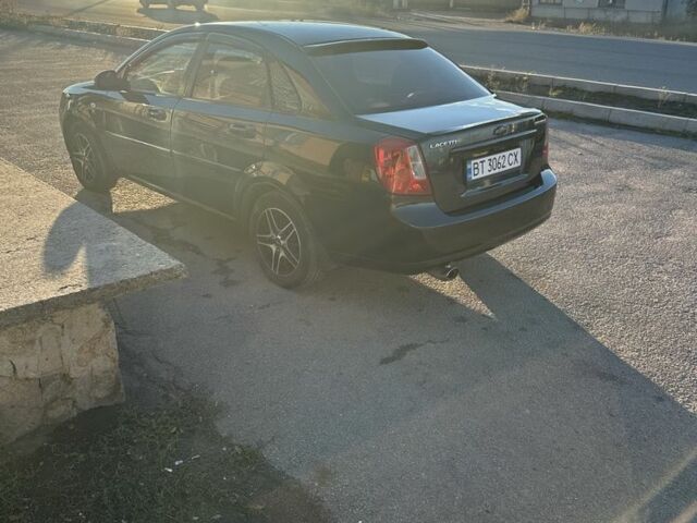 Черный Шевроле Лачетти, объемом двигателя 1.8 л и пробегом 220 тыс. км за 5000 $, фото 5 на Automoto.ua