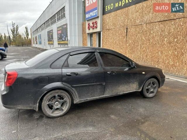 Черный Шевроле Лачетти, объемом двигателя 1.6 л и пробегом 230 тыс. км за 3900 $, фото 7 на Automoto.ua