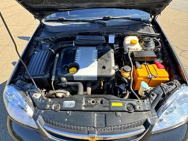 Черный Шевроле Лачетти, объемом двигателя 1.8 л и пробегом 145 тыс. км за 4800 $, фото 4 на Automoto.ua