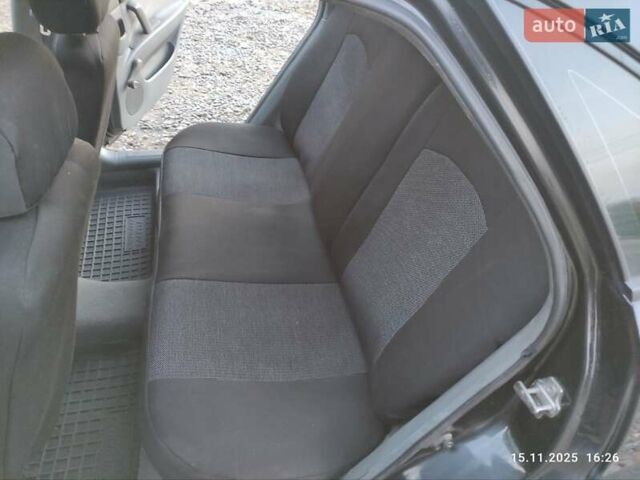 Черный Шевроле Лачетти, объемом двигателя 1.8 л и пробегом 244 тыс. км за 4200 $, фото 19 на Automoto.ua