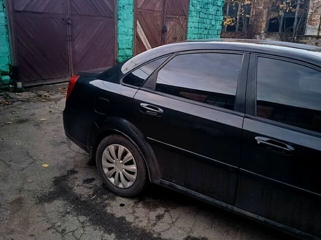 Черный Шевроле Лачетти, объемом двигателя 1.8 л и пробегом 243 тыс. км за 3500 $, фото 3 на Automoto.ua