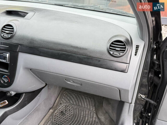 Черный Шевроле Лачетти, объемом двигателя 1.8 л и пробегом 202 тыс. км за 3999 $, фото 26 на Automoto.ua