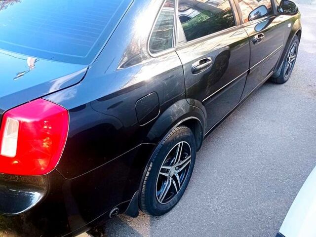 Чорний Шевроле Лачетті, об'ємом двигуна 1.8 л та пробігом 230 тис. км за 5000 $, фото 6 на Automoto.ua