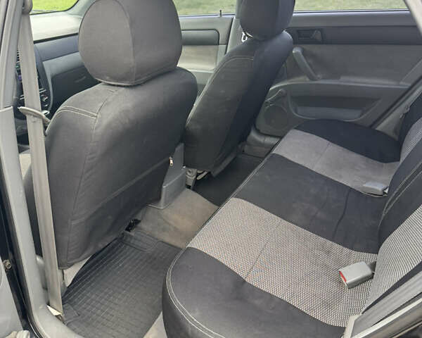 Черный Шевроле Лачетти, объемом двигателя 1.6 л и пробегом 153 тыс. км за 5000 $, фото 7 на Automoto.ua