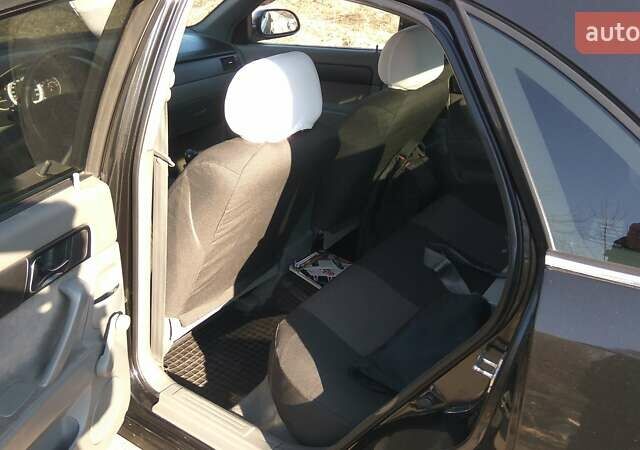 Чорний Шевроле Лачетті, об'ємом двигуна 1.8 л та пробігом 208 тис. км за 5000 $, фото 5 на Automoto.ua