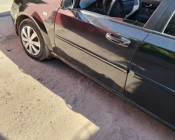 Черный Шевроле Лачетти, объемом двигателя 1.8 л и пробегом 290 тыс. км за 3700 $, фото 2 на Automoto.ua